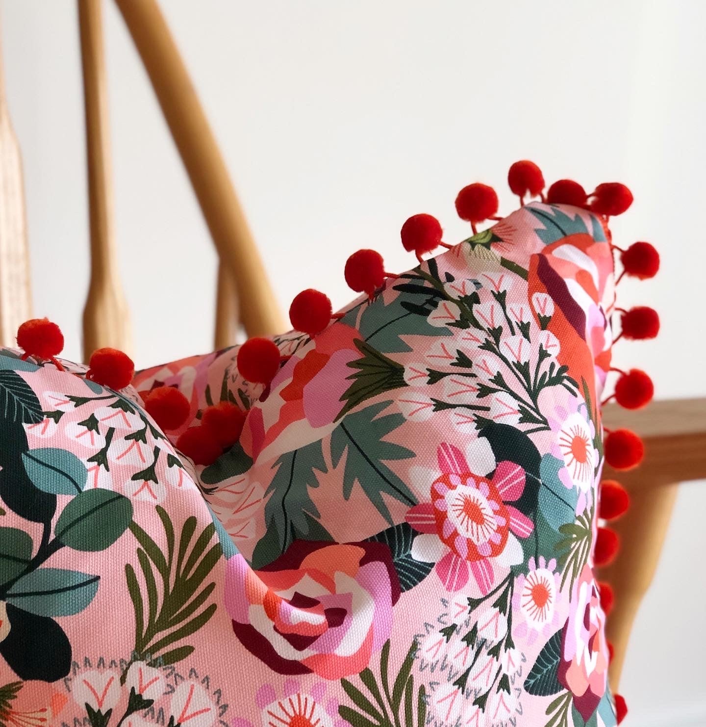 locally handmade cushion with bobble trim 45x45cm